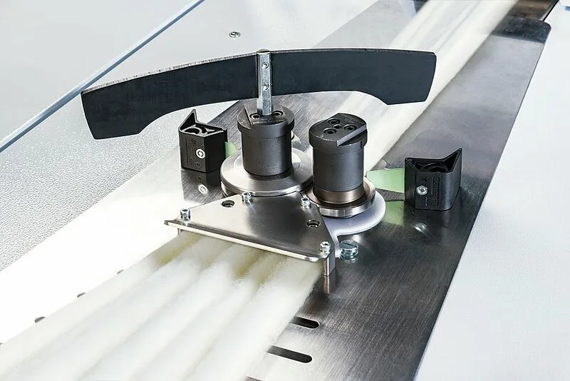 A man working on a textile machine